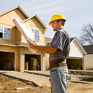 man building a house